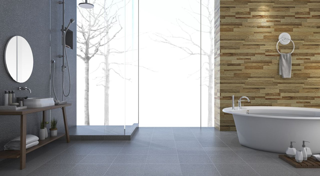 Badezimmer mit grauer freistehender Badewanne und Dusche Badezimmer mit grauer freistehender Badewanne und Dusche